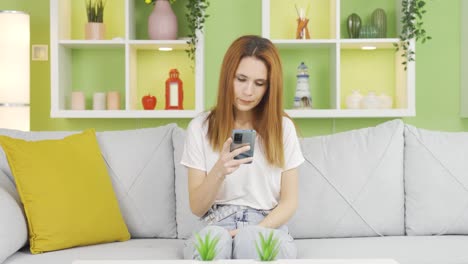 Young-woman-not-using-mobile-app-on-phone.